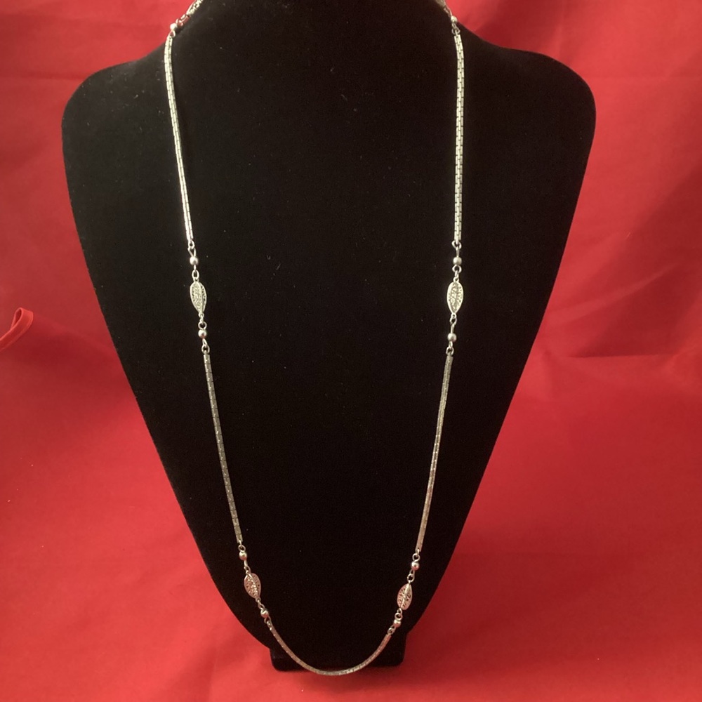 Long silver tone with leaves necklace
